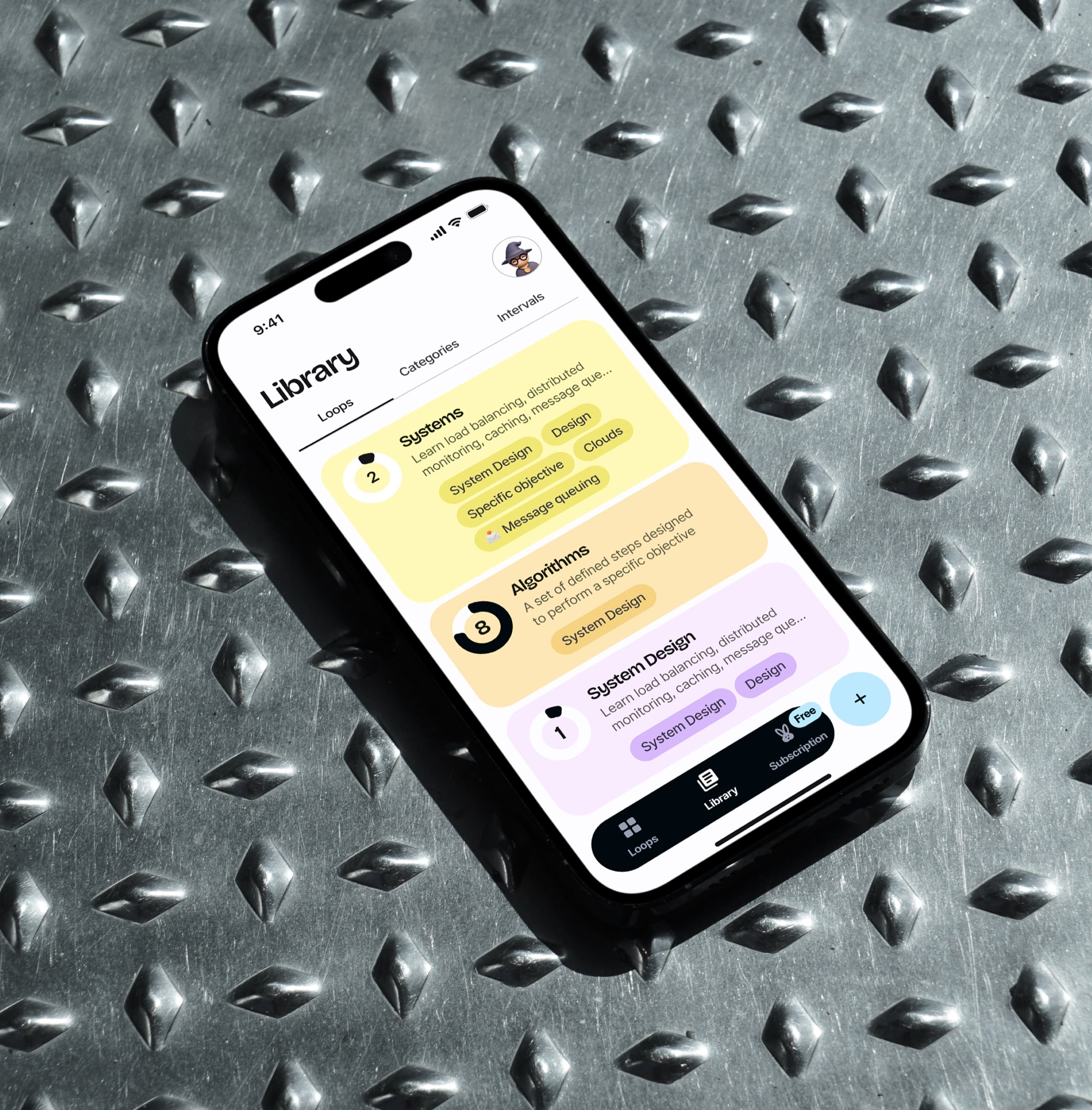 The Library screen on an iPhone: Loops, Categories and Intervals tabs, and a list of cards with tags